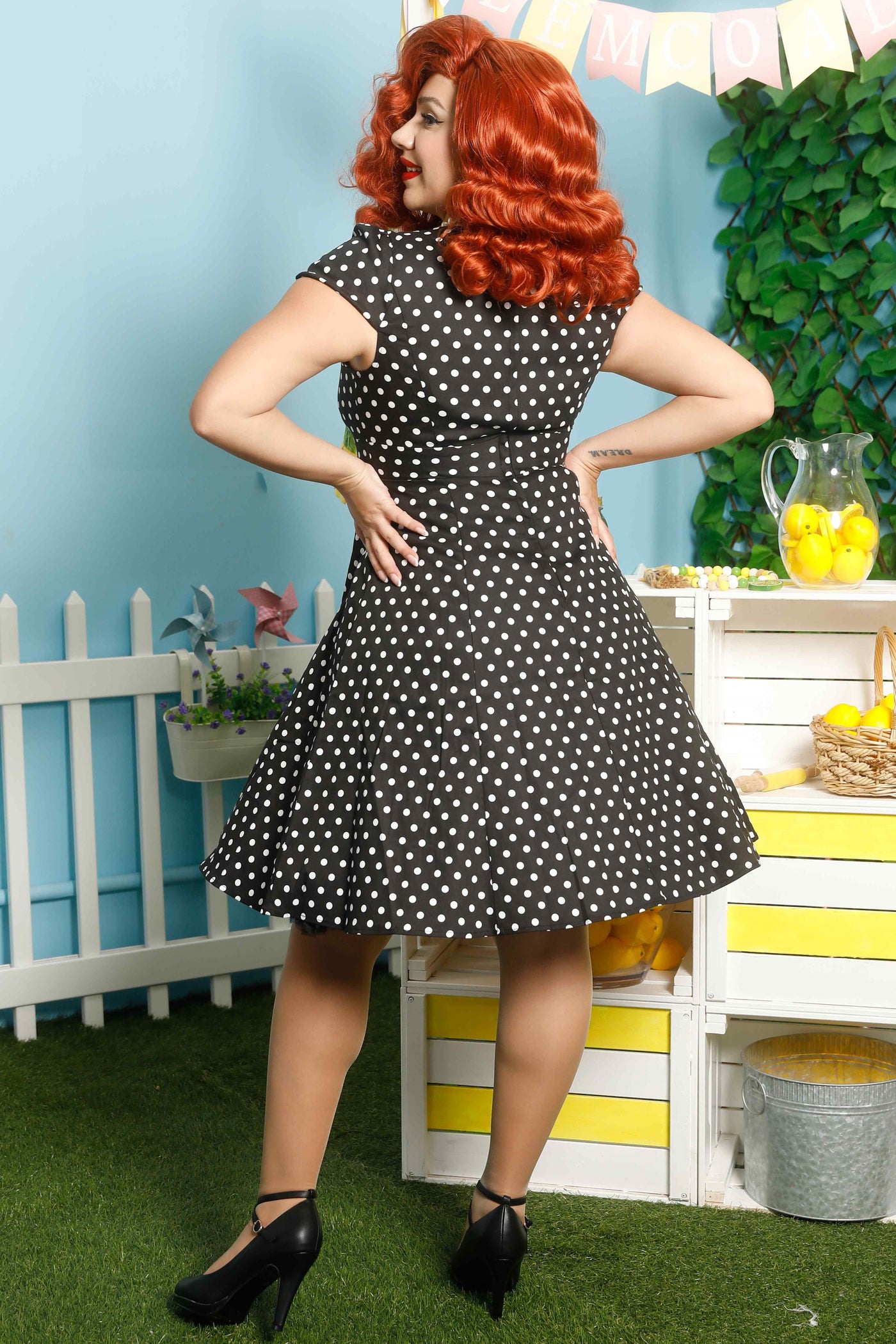 Model photo of Flirty Fifties Style Dress in Black