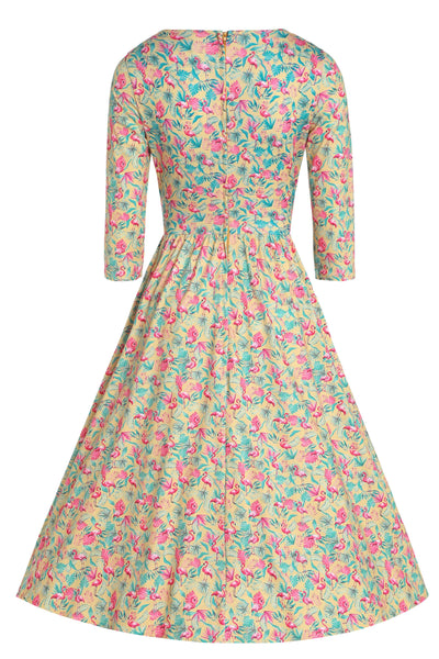Back view of Flock Star Flamingo Print Flared Dress in Yellow