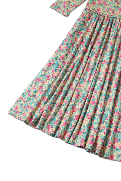 Close up view of Flock Star Flamingo Print Flared Dress in Yellow