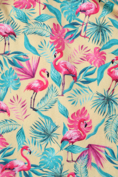 Close up view of Flock Star Flamingo Print Flared Dress in Yellow