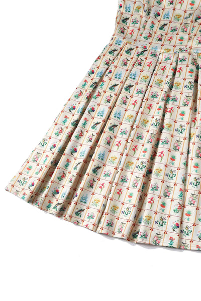 Close up view of Floral & Bird Flared Dress