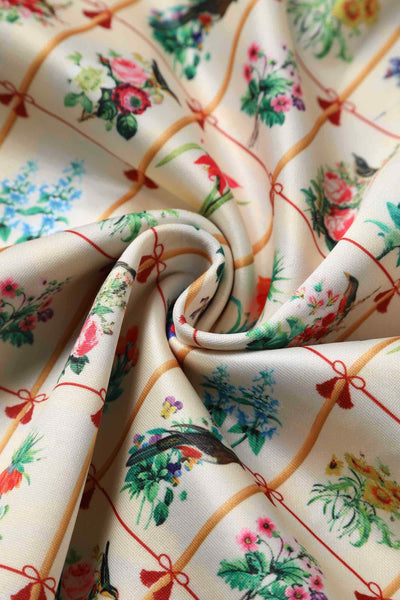 Close up view of Floral & Bird Flared Dress