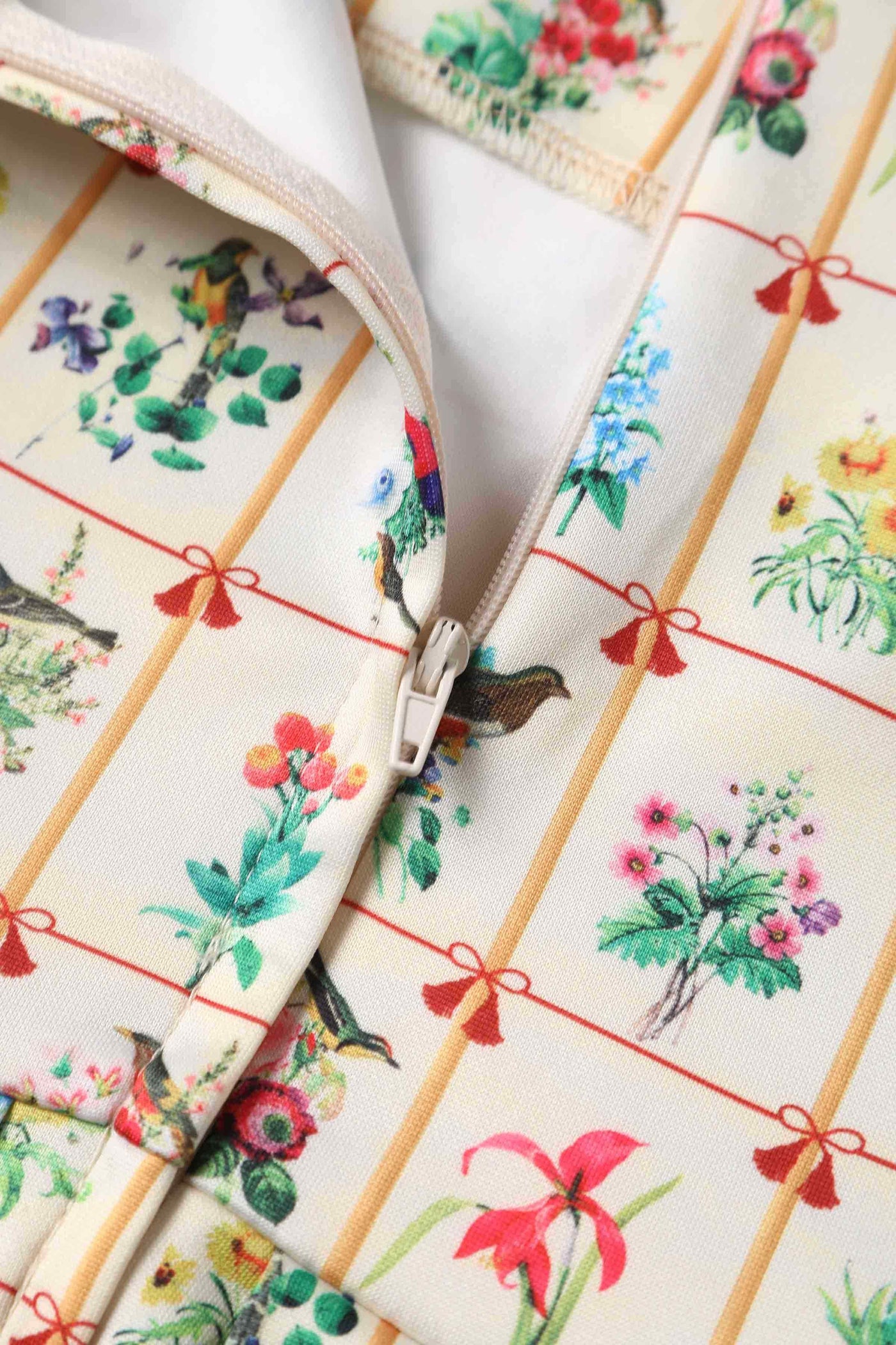Close up view of Floral & Bird Flared Dress