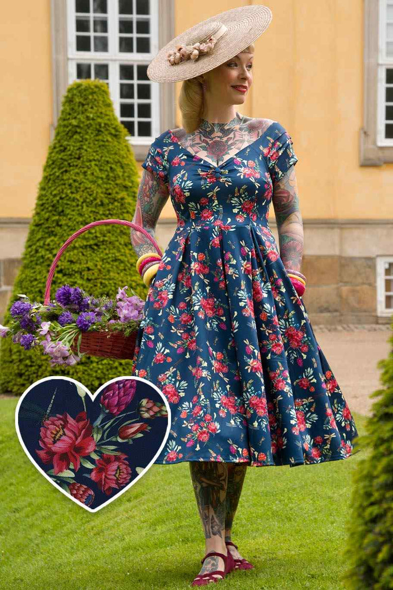 A model wearing a Floral Dragonfly Off Shoulder Dress