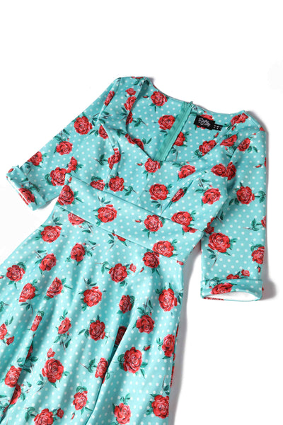 Close up view of Floral Rose Midi Dress In Baby Blue