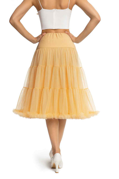 Back view of A model wearing a Fluffy Net Petticoat 25.5 In Champagne