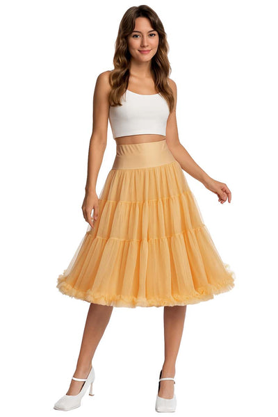 A model wearing a Fluffy Net Petticoat 25.5 In Champagne