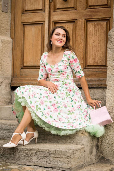 A lady wearing a Fluffy Net Petticoat 25.5 Inches In Mint Green