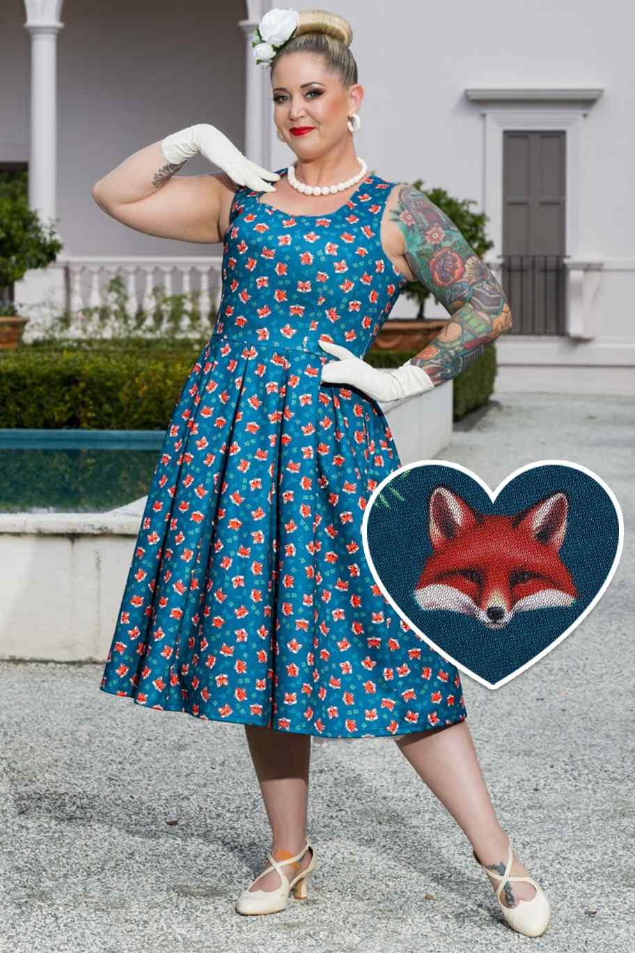 Model wearing a Pleated Retro Dress in Dark Blue Fox Print