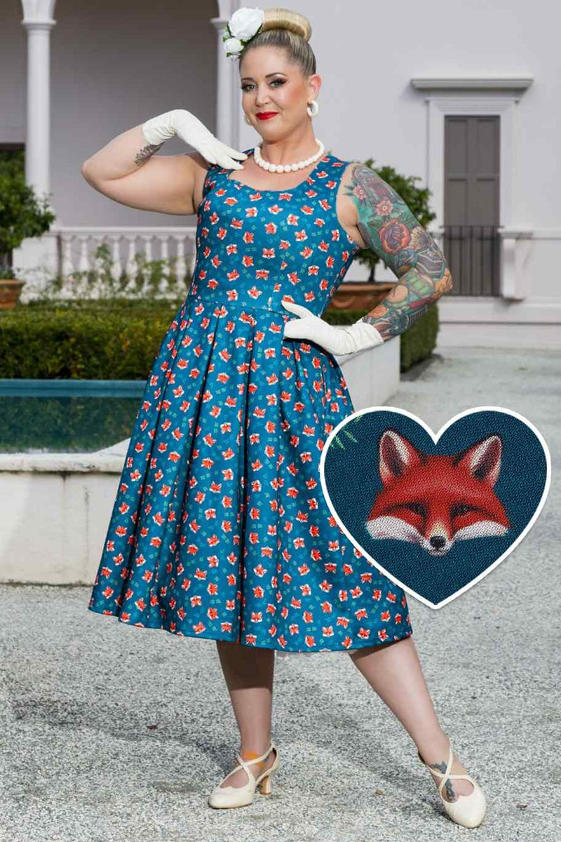 Model wearing a Pleated Retro Dress in Dark Blue Fox Print