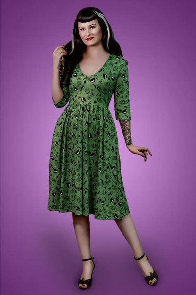 A charming model wearing a Frankenstein & The Bride Print Dress