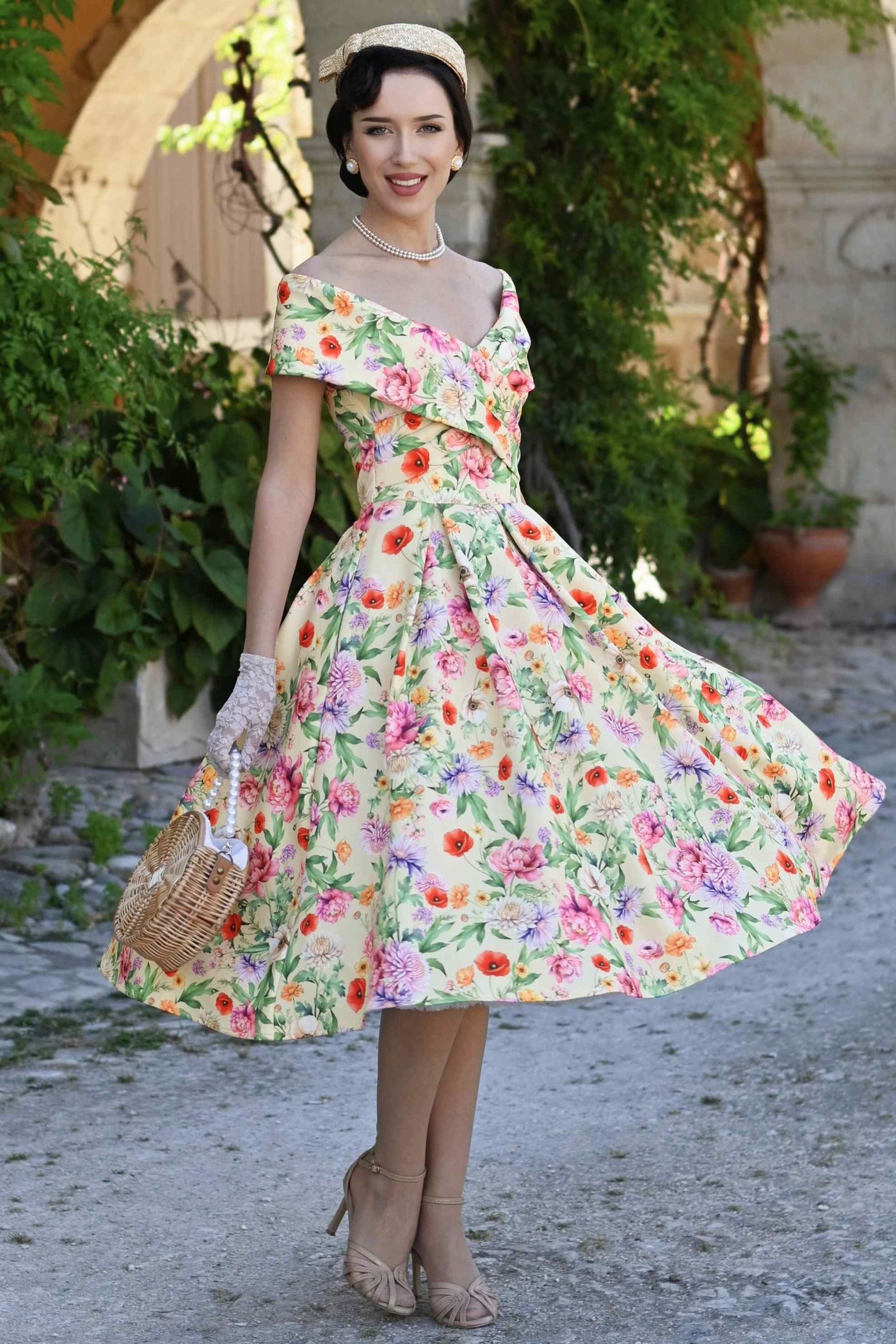 A lady wearing a Beverly Garden Floral Off Shoulder Dress In Mint Green