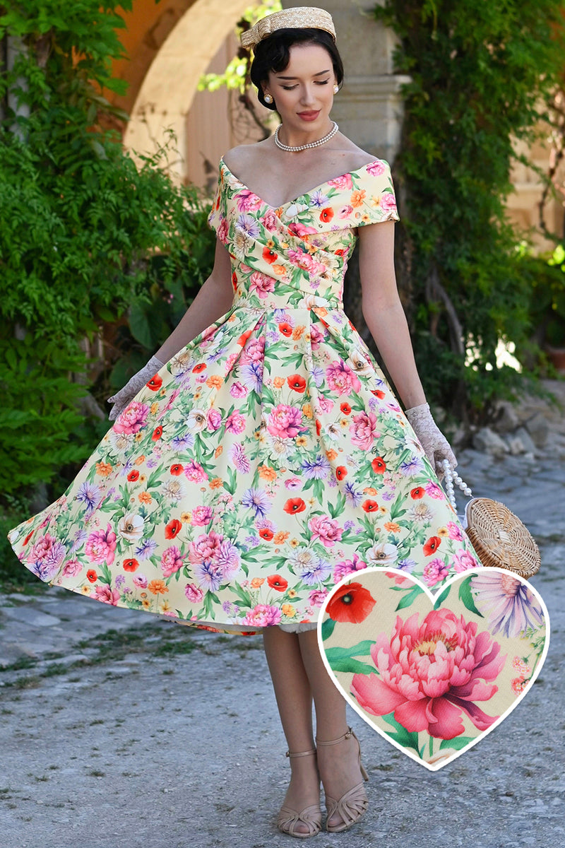 A woman wearing a Beverly Garden Floral Off Shoulder Dress In Mint Green