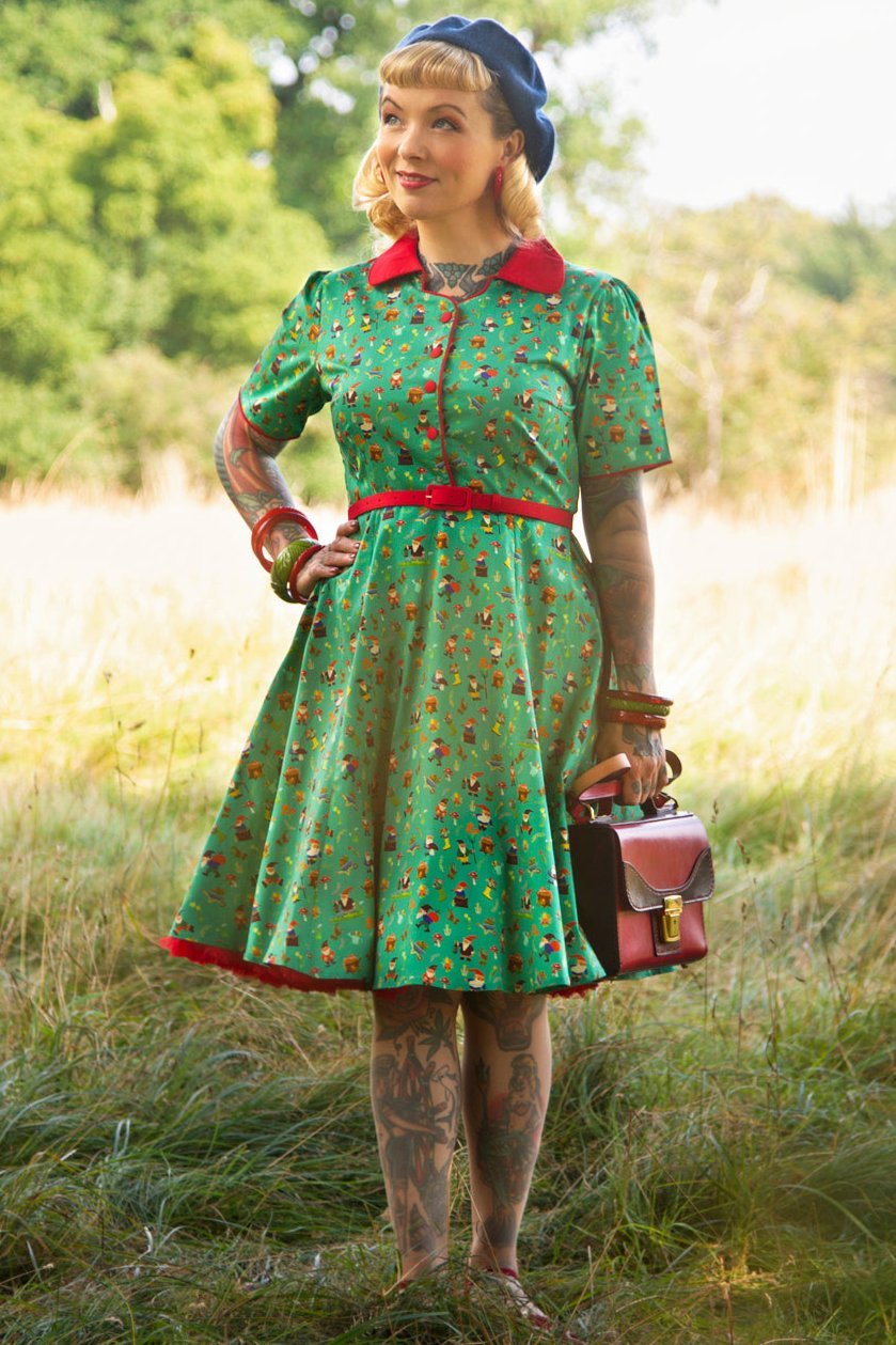 A model wearing a Garden Gnome Shirt Dress In Green