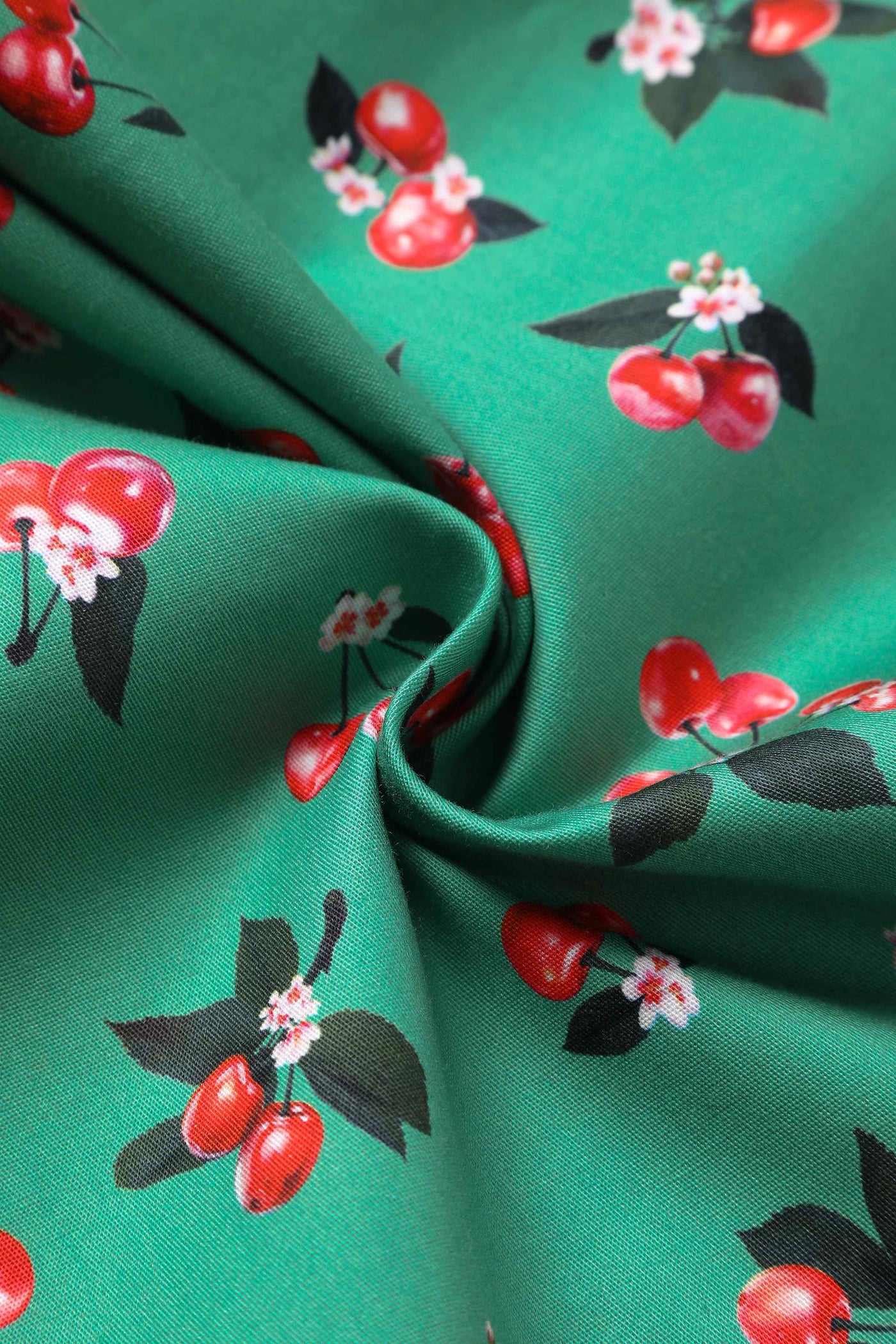 Close up view of Green Cherry Pleated Bust Dress