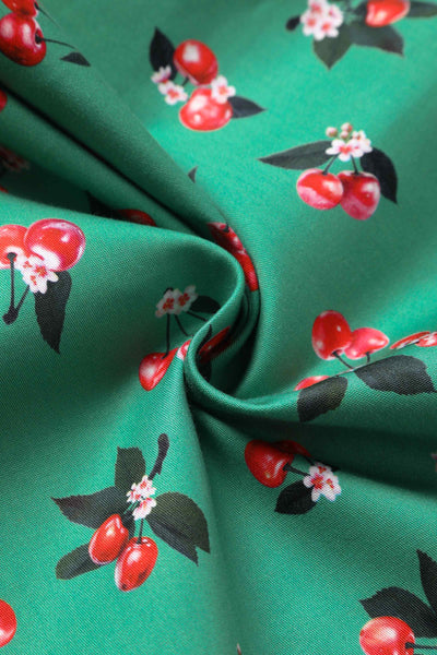 Close up view of Green Cherry Pleated Bust Dress