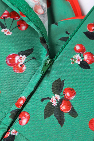 Close up view of Green Cherry Pleated Bust Dress