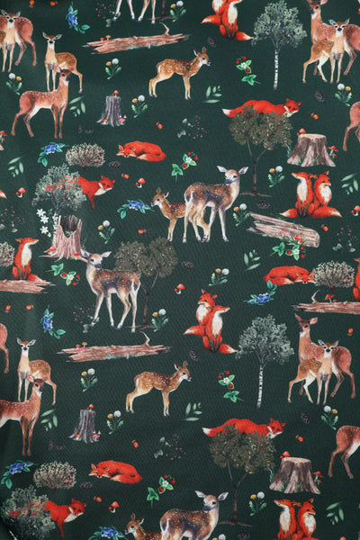 Close up view of Green Fox & Deer Print Off Shoulder Dress