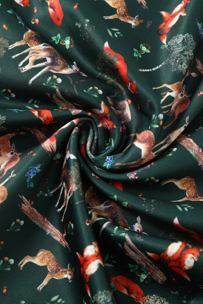 Close up view of Green Fox & Deer Print Off Shoulder Dress