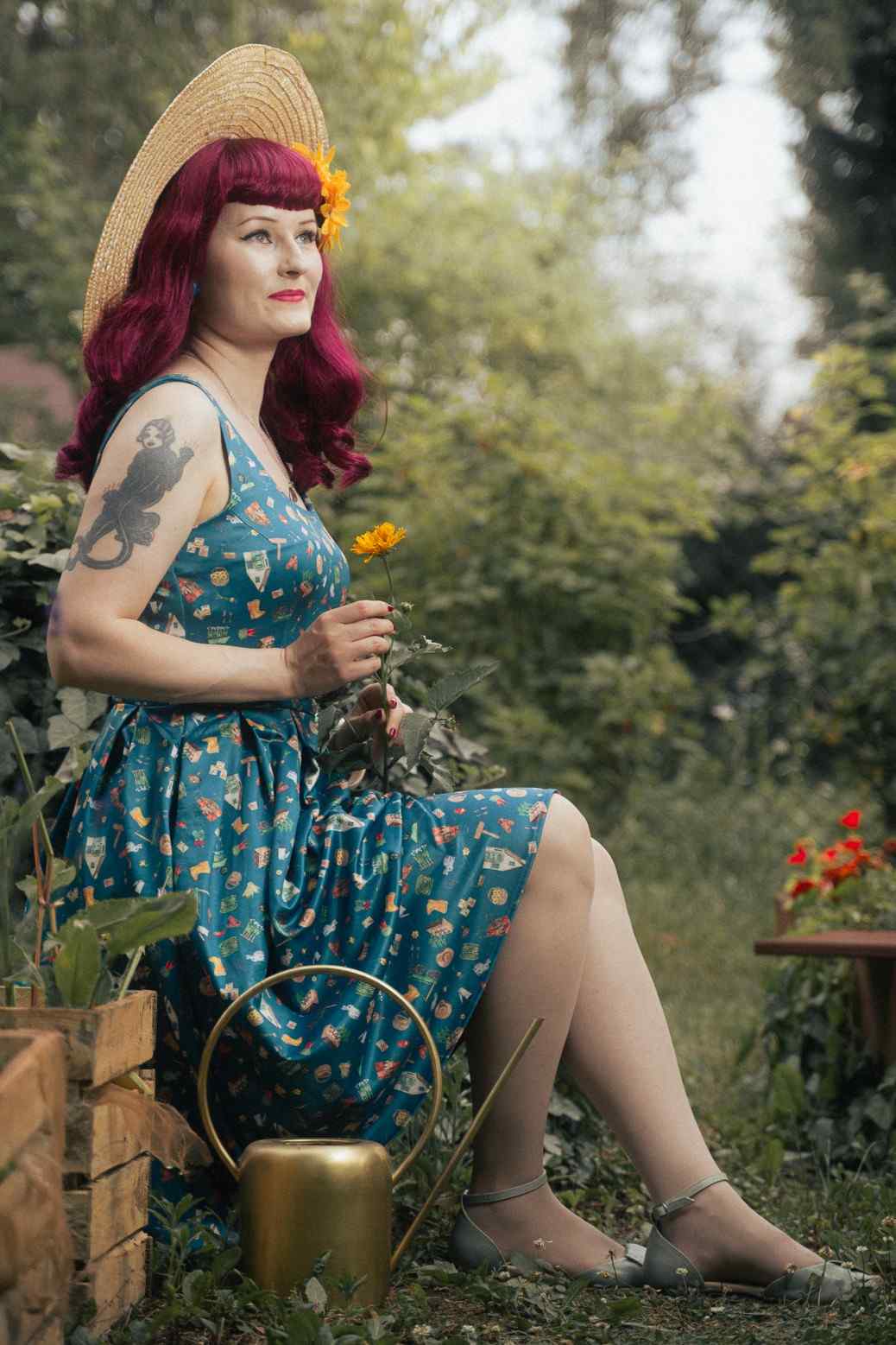 A model photo of a Green Gardening Print Swing Dress