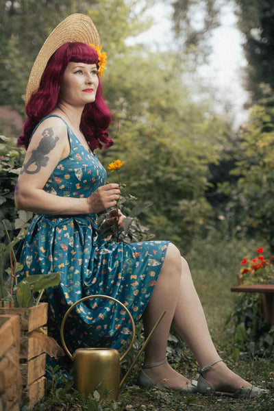A model photo of a Green Gardening Print Swing Dress