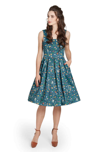 Model wearing Green Gardening Print Swing Dress