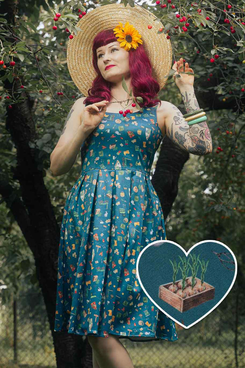 A women wearing a Green Gardening Print Swing Dress
