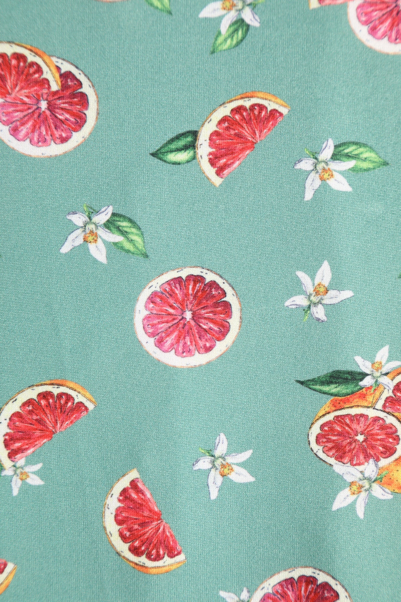 Close up view of Green Grapefruit Petal Sleeved Tea Dress