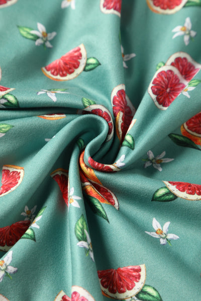 Close up view of Green Grapefruit Petal Sleeved Tea Dress