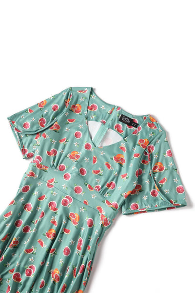 Close up view of Green Grapefruit Petal Sleeved Tea Dress