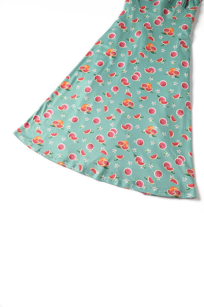 Close up view of Green Grapefruit Petal Sleeved Tea Dress