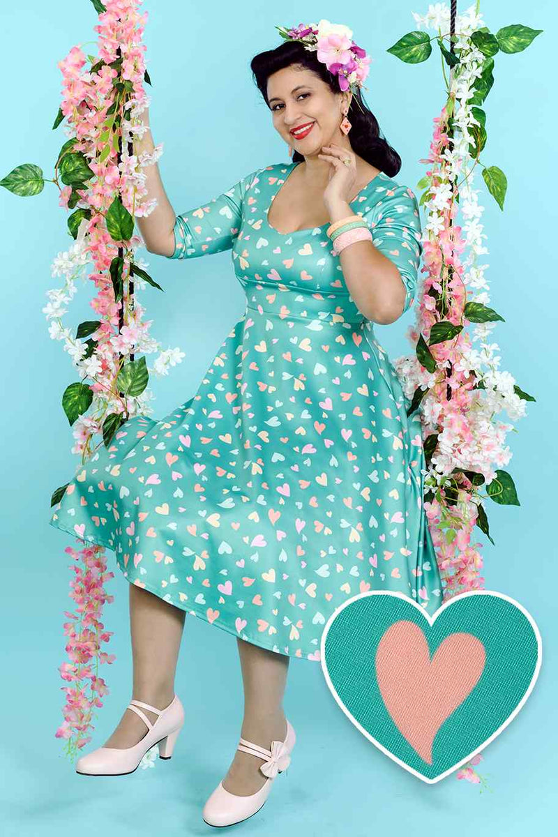 A model wearing Green Heart Print Midi Dress
