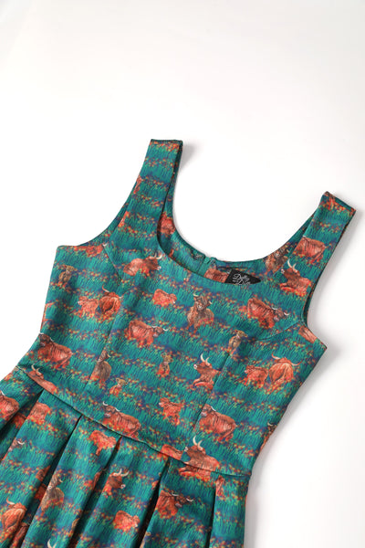 Close up view of Green Highland Cattle Swing Dress