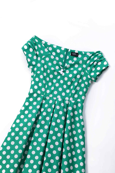Close up view of Green Polka Dot Off Shoulder Dress