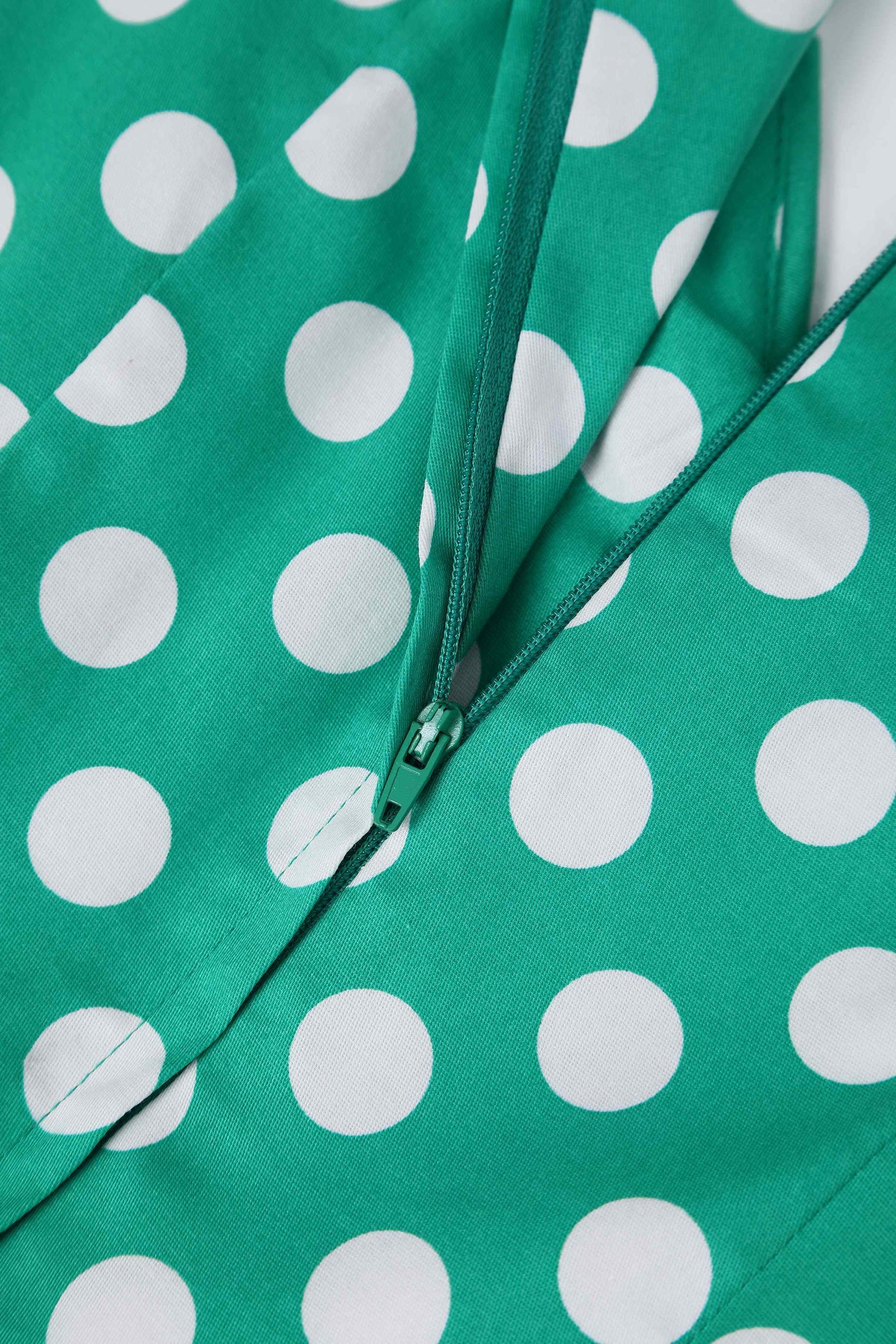 Close up view of Green Polka Dot Off Shoulder Dress