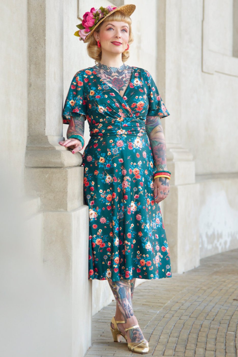 A model wearing a Green Vintage Floral Crossover Bust Dress