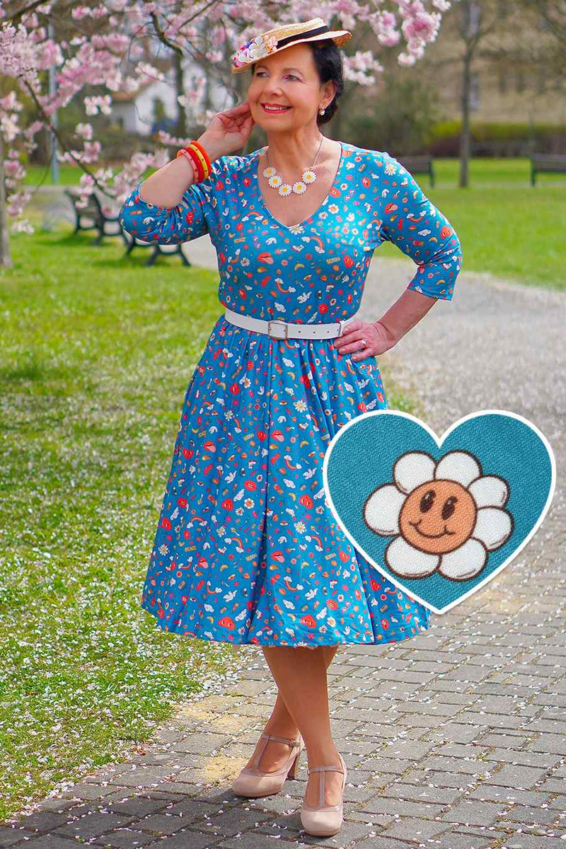 A lady wearing a Groovy Turquoise Long Sleeved Dress
