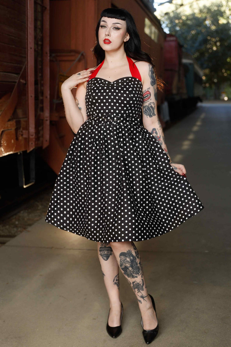 Front view of model wearing Halterneck Black Polka Dot Swing Dress