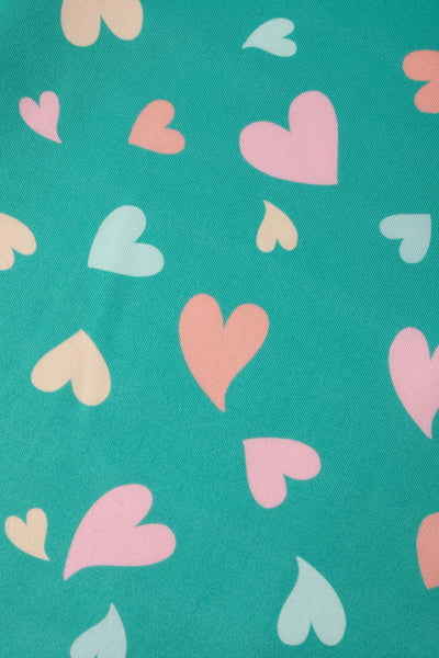 Close up view of Heart Print Midi Dress in Green