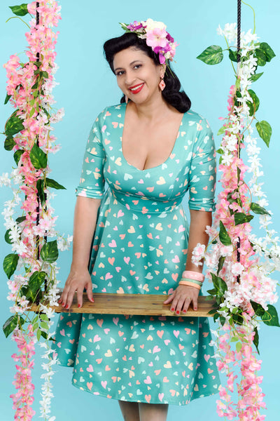A model wearing a Green Heart Print Midi Dress