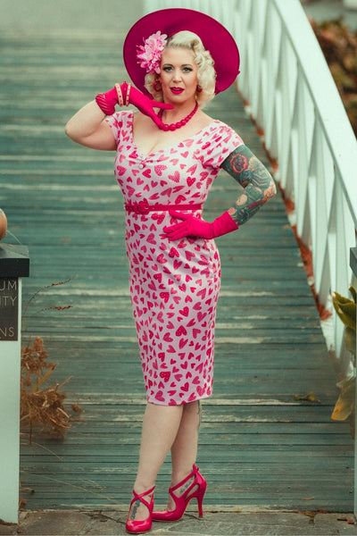 A model wearing a Pink Heart Off Shoulder Pencil Dress