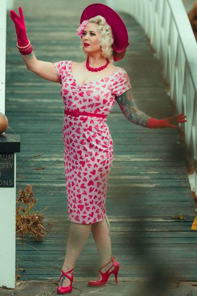 A model wearing a Pink Heart Off Shoulder Pencil Dress