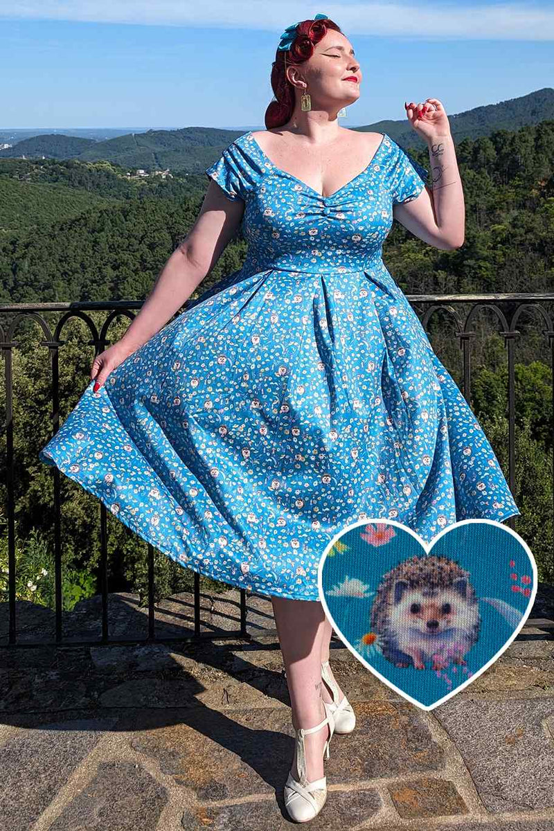 A model wearing a Hedgehogs Blue Off Shoulder Dress