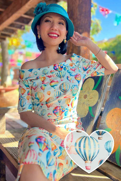 A model wearing a Hot Air Balloon Fitted Off Shoulder Dress