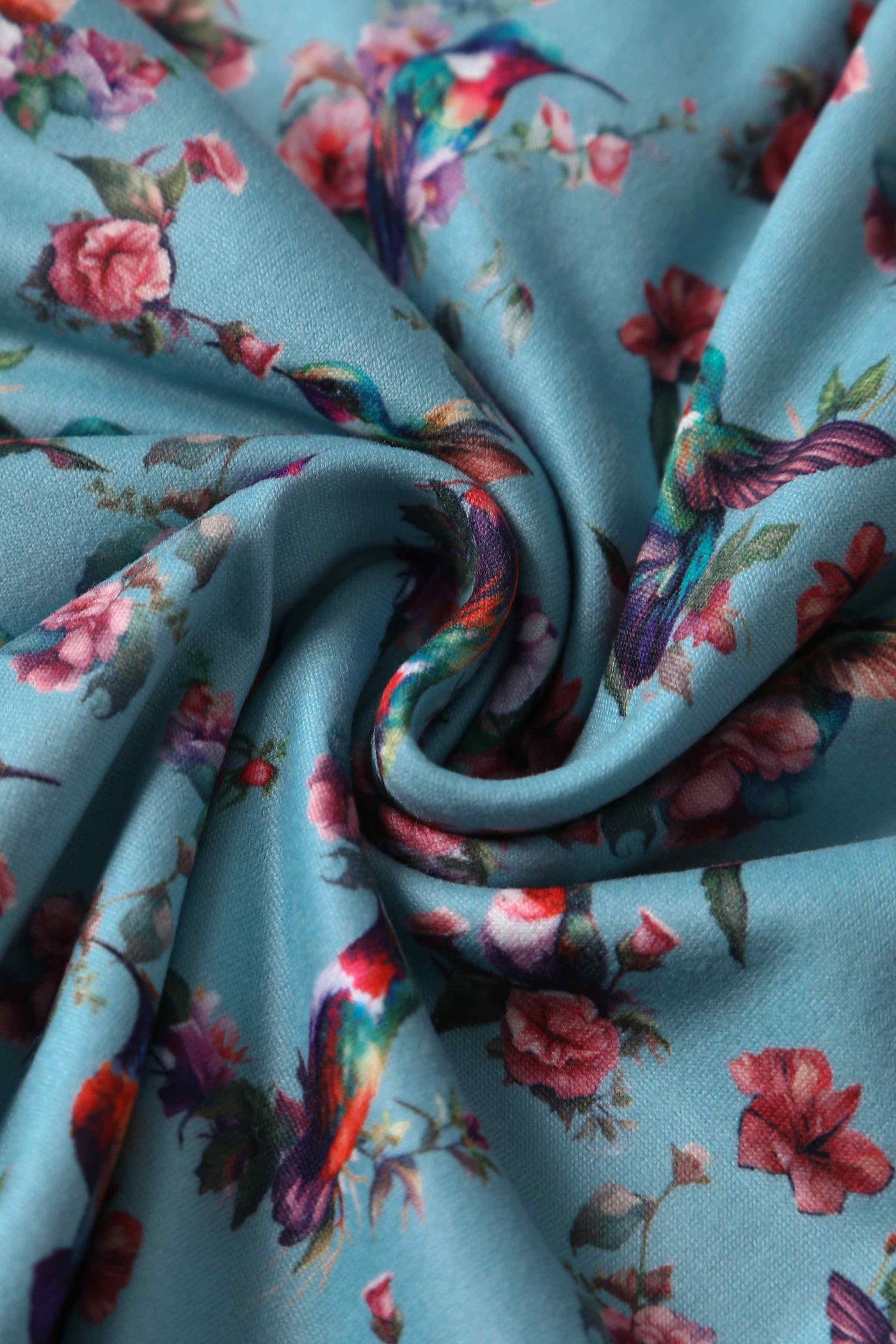 Close up View of Hummingbird Blue Wrap Dress