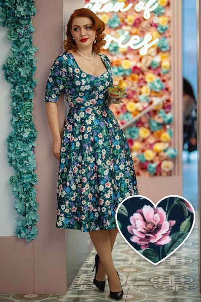 A model wearing a Hydrangea Floral Dress