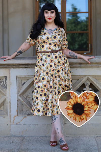 A model wearing a Julia Sunflower Midi Dress