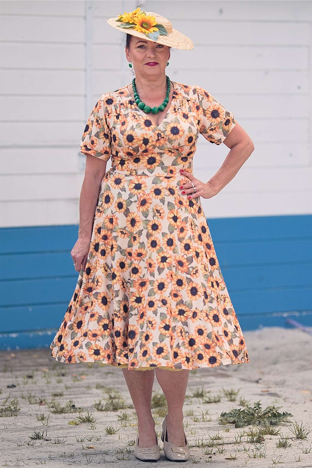 A lovely woman wearing a Julia Sunflower Midi Dress