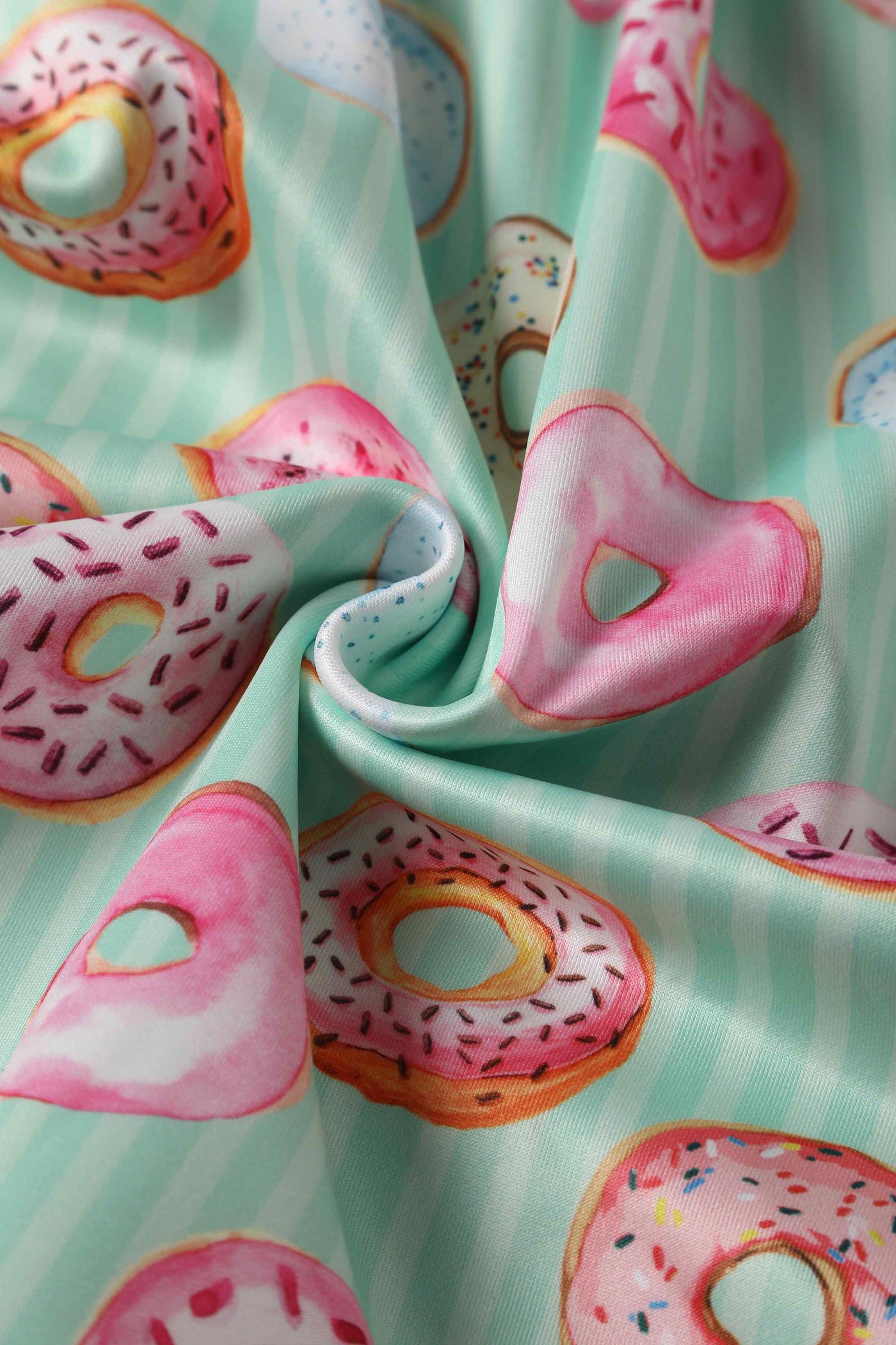 Close up view of Kids Donut Green Swing Dress