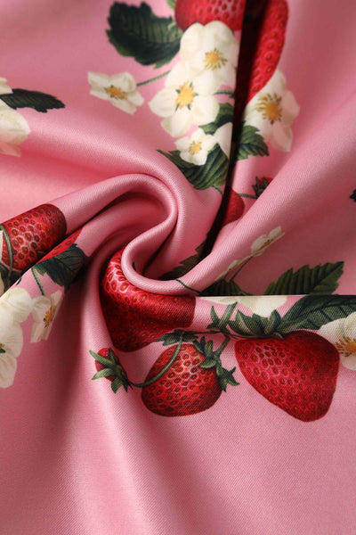 Close up view of Kids Pink Strawberry Swing Dress